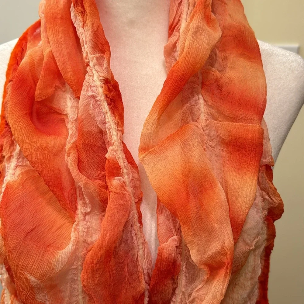 Vintage Masino Silk and Wool Crinkle Scarf in vibrant orange hues.